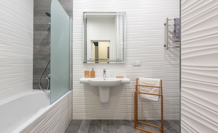 Modern bathroom with bath and washbasin