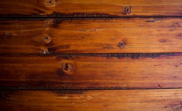Close-up texture of polished wooden floorboards